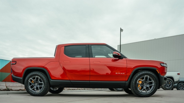 The Rivian R1T electric vehicle (EV) pickup truck outside the company's manufacturing facility in Normal, Illinois, US., on Monday, April 11, 2022. Rivian Automotive Inc. produced 2,553 vehicles in the first quarter as the maker of plug-in trucks contended with a snarled supply chain and pandemic challenges.