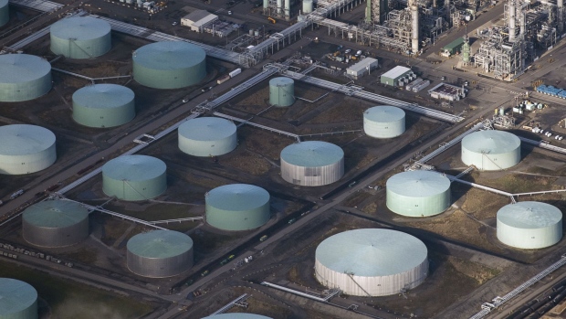 Oil ekes out gain as fuel supplies shrink, EU weighs Russia ban