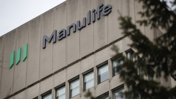 Manulife earning slip on market performance, hurricane costs