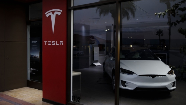 Tesla seeks rapid output boost as profit beats estimates