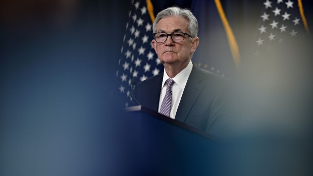 Powell says tighter credit could mean a lower peak in rates