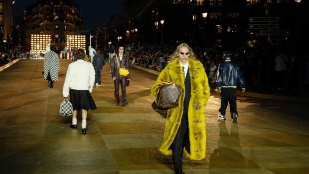 Pharrell Unveils His Vision for Louis Vuitton on Paris' Oldest Bridge - BNN  Bloomberg