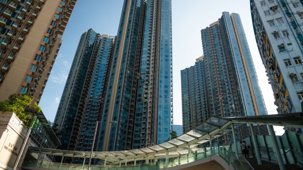 Residential buildings in Hong Kong, China, on Sunday, Sept. 24, 2023. Hong Kong rents are rising again as overseas workers return, a recovery that contrasts with the cooling market in rival financial hub Singapore. Photographer: Bertha Wang/Bloomberg