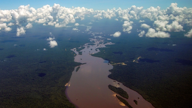 The Essequibo River in the Amazon rainforest in the Potaro-Siparuni region of Guyana  Photographer: Patrick Fort/AFP/Getty Images