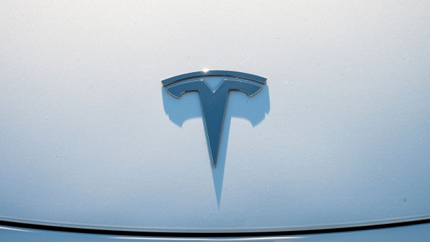 Tesla Skips Merit-Based Stock Awards, Squeezing Compensation - BNN