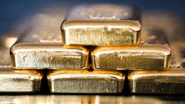Gold bars sit stacked in this arranged photograph in Hungary. Photographer: Bloomberg Creative Photos/Bloomberg