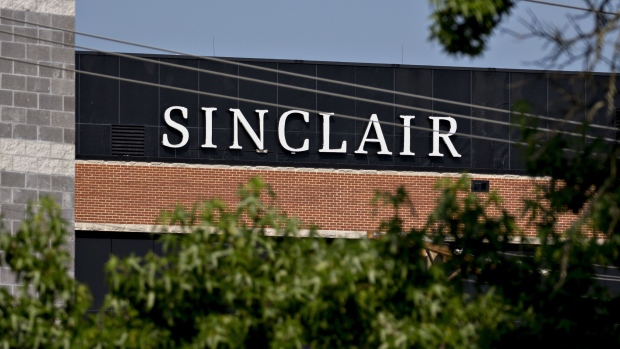 Signage is displayed outside the Sinclair Broadcast Group Inc. headquarters in Cockeysville, Maryland, U.S., on Friday, Aug. 10, 2018. On Thursday, after months of intense scrutiny from regulators, progressive activists, elected politicians and media watchdog groups, Sinclair's long-pending deal to acquire Tribune Media Co. officially fell apart. Photographer: Andrew Harrer/Bloomberg