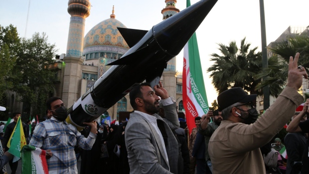 A group gather in Palestine Square in the Iranian capital Tehran, staging a demonstration to support Iran's drone and missile attacks on Israel, on April 15. Photographer: Fatemeh Bahrami/Anadolu/Getty Images