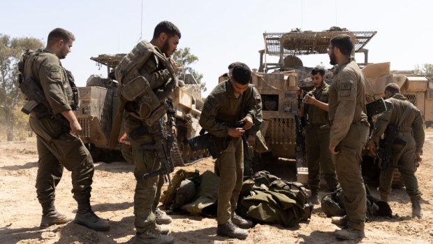 <p>Israeli soldiers prepare to enter the Gaza Strip on April 15 in Southern Israel. Israel's allies have urged the country to avoid escalation of conflict with Iran after it launched hundreds of missiles and drones at Israel over the weekend.</p>