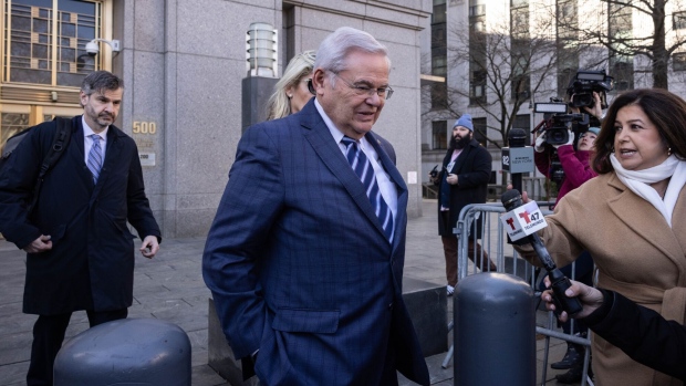 <p>Bob Menendez departs federal court in New York on March 11.</p>