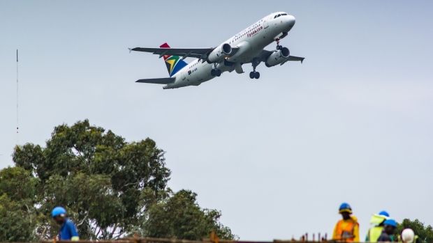 <p>A South African Airlines aircraft takes off from O.R. Tambo International Airport in Johannesburg.</p>