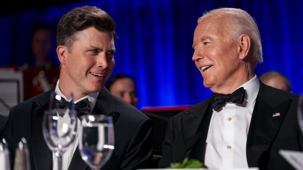 US President Joe Biden speaks with comedian Colin Jost during the White House Correspondents' Association (WHCA) dinner in Washington, DC, US on Saturday, April 27, 2024. The annual dinner raises money for WHCA scholarships and honors the recipients of the organization's journalism awards. Photographer: Bonnie Cash/UPI/Bloomberg