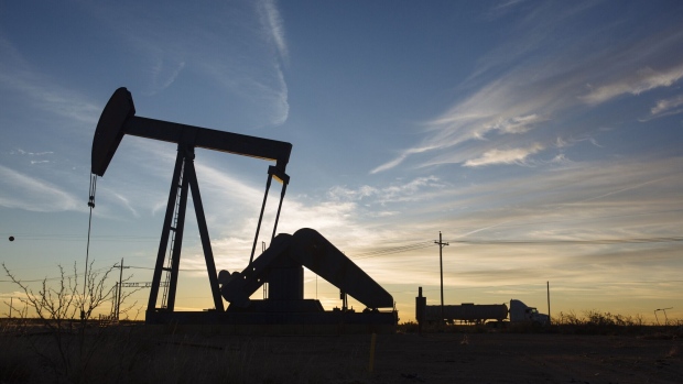 A pump jack stands at dusk in the Permian Basin area in Texas, U.S. Photographer: Bloomberg Creative Photos/Bloomberg