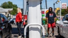 <p>People pump gas in Austin, Texas. </p>