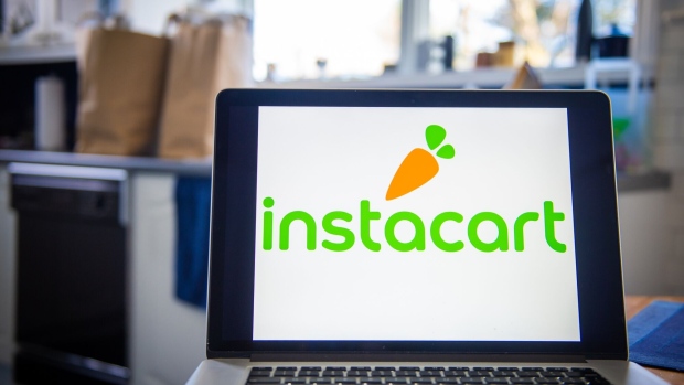The Instacart logo on a laptop computer arranged in Hastings-on-Hudson, New York, U.S., on Monday, Jan. 4, 2021. A booming market for U.S. initial public offerings shows no sign of slowing in 2021. Grocery-delivery company Instacart Inc. is preparing for a listing, according to people familiar with the matter. Photographer: Tiffany Hagler-Geard/Bloomberg
