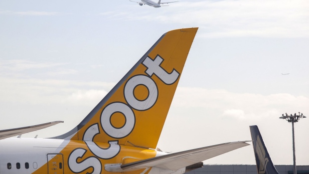 <p>An aircraft operated by Scoot on the tarmac at Changi Airport in Singapore.</p>