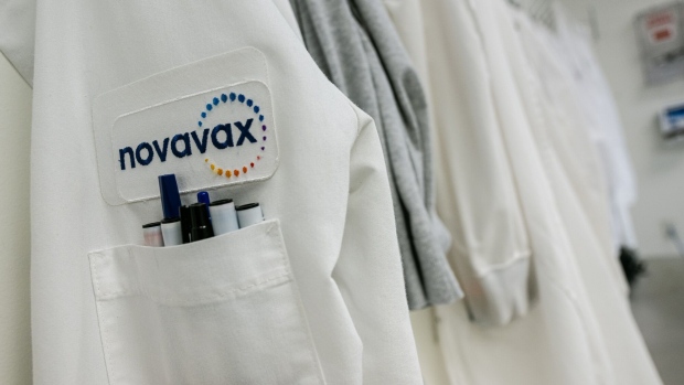 A Novavax logo on a lab coat at the company's facility in Gaithersburg, Maryland, US, on Wednesday, May 18, 2022. Novavax is confident its Covid-19 vaccine will receive the endorsement of the Food and Drug Administration’s advisory committee early this summer, executives said this week, reports CNBC. Photographer: Jon Cherry/Bloomberg