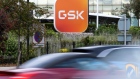 The GSK Plc logo on a sign outside the headquarters of the company in the Brentford district of London, UK, on Monday, Oct. 31, 2022. GSK is due to report its latest earnings figures on Nov. 2.