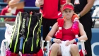 Eugenie Bouchard sits in her chair between games at the Rogers Cup WTA tournament in Toronto