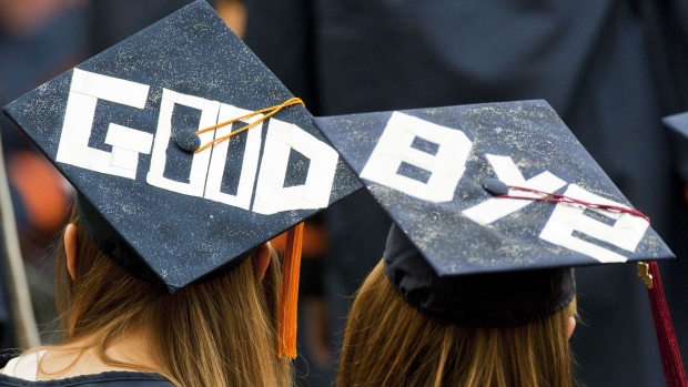 Graduates during a commencement ceremony. Photographer: Michael Okoniewski/Bloomberg