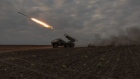 A Ukrainian Grad rocket launcher fires towards Russian positions in the Kharkiv region on May 15. Photographer: Roman Pilpey/AFP/Getty Images