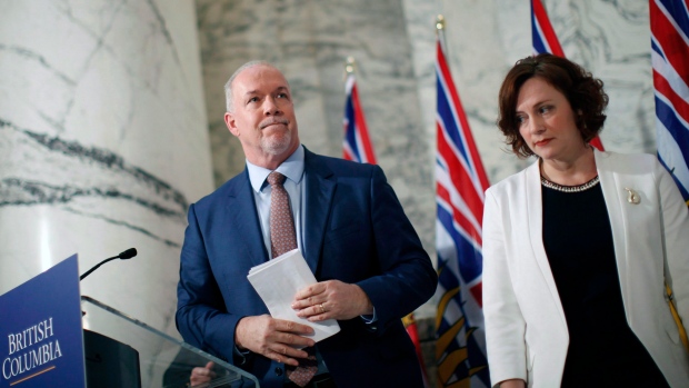 B.C. Premier John Horgan and Minister of Energy Michelle Mungall