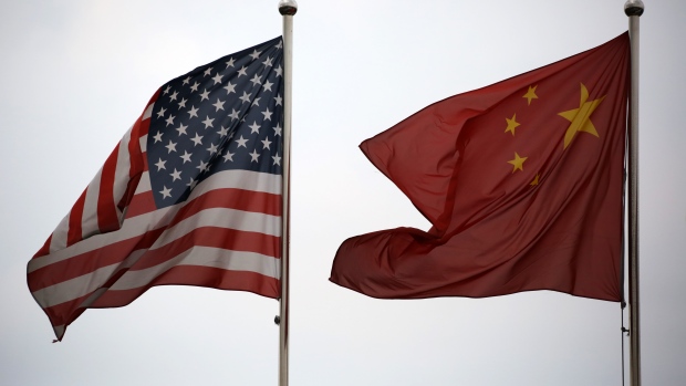 U.S. and Chinese national flags.