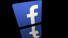 The Facebook Inc. logo is displayed on an Apple Inc. iPad Air in this arranged photograph in Washington, D.C., U.S., on Monday, Jan. 27, 2014.