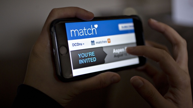 The Match.com website is demonstrated for a photograph on an Apple Inc. iPhone in Washington, D.C., U.S., on Sunday, Jan. 30, 2017. Match Group Inc. is expected to release fourth-quarter earnings figures on January 31.