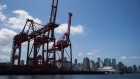 Gantry cranes stand at the Port of Vancouver in Vancouver, British Columbia. 