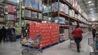 Stacked goods inside a Costco store.