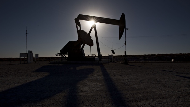 The silhouette of an oil pump jack is seen in Texas, U.S.