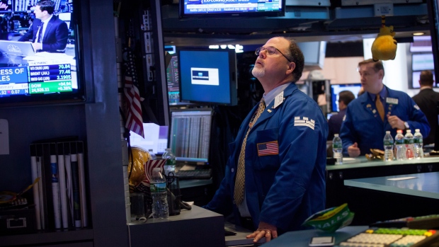 A trader works on the floor of the New York Stock Exchange (NYSE) in New York, U.S., on Monday, May 14, 2018. U.S. stocks edged higher as trade tensions between the world's two biggest economies showed signs of abating.
