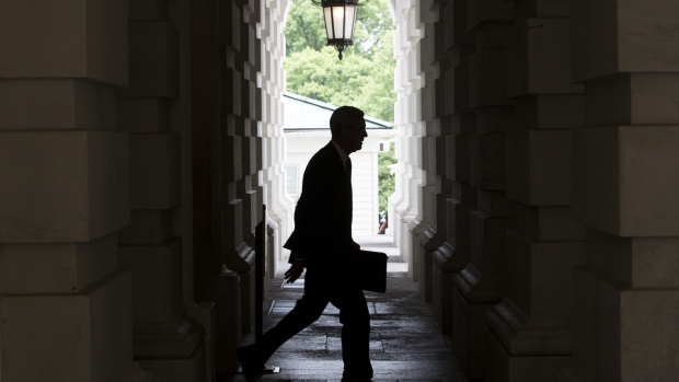 Mueller leaving the U.S. Capitol Building. Photographer: Zach Gibson/Bloomberg