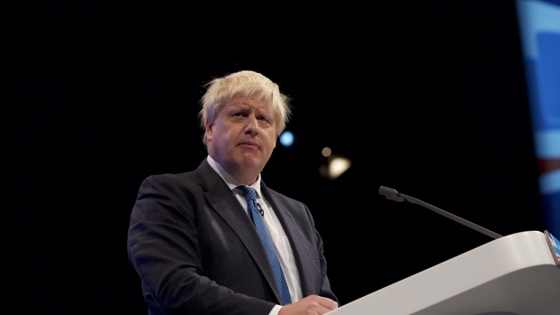 Boris Johnson, U.K. foreign secretary, pauses while delivering his speech at the annual Conservative Party conference in Manchester, U.K., on Tuesday, Oct. 3, 2017. With the Tories beset by continued splits over Brexit and speculation over Theresa May's future, investors are watching the party conference closely. 