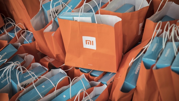 Boxes of Xiaomi Corp. Mi In-Ear Headphones Pro sit on display inside a Xiaomi store in Beijing, China, on Tuesday, April 3, 2018. 