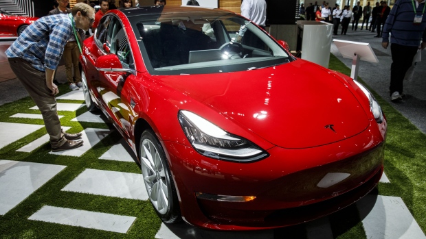 The Tesla Inc. Model 3 vehicle is displayed during AutoMobility LA ahead of the Los Angeles Auto Show in Los Angeles, California, U.S., on Wednesday, Nov. 29, 2017. AutoMobility LA brings automakers, tech companies, designers, developers, startups, investors, dealers, government officials and analysts together to unveil the future of transportation with over 50 vehicle debuts. 