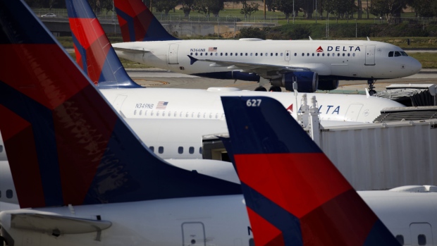 A Delta Air Lines Inc. aircraft taxis at Los Angeles International airport (LAX) in Los Angeles. 