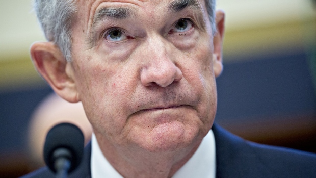 Jerome Powell, chairman of the U.S. Federal Reserve, listens during a House Financial Services Committee hearing in Washington, D.C., U.S., on Tuesday, Feb. 27, 2018. Powell said the central bank can continue gradually raising interest rates as the outlook for growth remains strong, and the recent bout of financial volatility shouldn\'t weigh on the U.S. economy. 