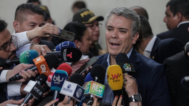 Ivan Duque, presidential candidate for the Democratic Center Party, speaks during the closing campaign rally in Bogota, Colombia, on Sunday, May 20, 2018. Colombians vote in the first round of presidential elections on May 27, with a run-off vote on June 17 should no one candidate get more than 50 percent of the vote. Photographer: Mauricio Palos/Bloomberg