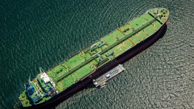 The Alaskan Frontier oil tanker takes on fuel at an outside anchorage in this aerial photograph taken near the Port of Los Angeles in Los Angeles, California, U.S., on Thursday, April 19, 2018. Senior trade officials from the U.S., Canada and Mexico will meet again in Washington in an intensified push to reach a Nafta agreement in the next few weeks. Talks will pick up on Tuesday, after cabinet-level members vowed on Friday to keep up the momentum following consultations with their technical teams over the weekend. 