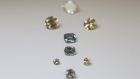 High pressure high temperature (HPHT) synthetically produced diamonds sit on display at De Beers Technologies research laboratory in Maidenhead.