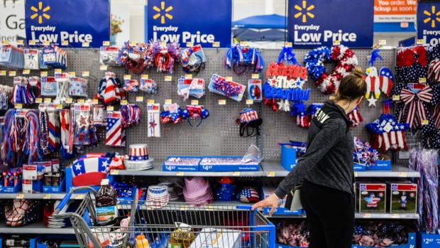 A customer views American flag themed decorations for sale at a Walmart Inc. store in Secaucus, New Jersey, U.S., on Wednesday, May 16, 2018. 