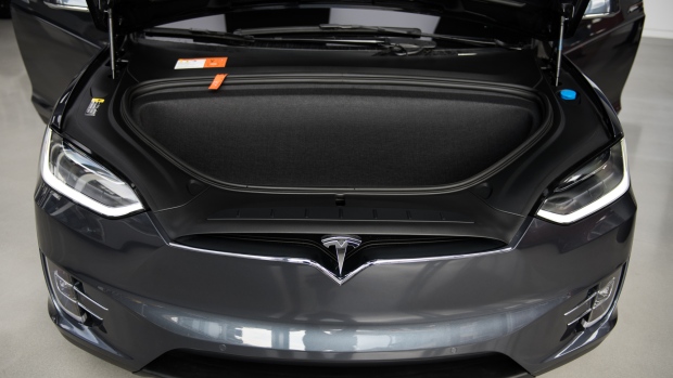 The front trunk space of a Tesla Inc. Model X P100D sports utility vehicle (SUV) is seen at the company's new showroom in New York, U.S., on Thursday, Dec. 14, 2017. The Meatpacking District location, which opens to the public at 11 a.m. Friday, lets customers for the first time explore energy offerings, configure cars and place orders all under one roof. 