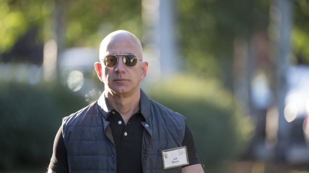 Jeff Bezos, founder and chief executive officer of Amazon.com Inc., arrives for the morning sessions during the Allen & Co. Media and Technology Conference in Sun Valley, Idaho, U.S., on Thursday, July 13, 2017. The 34th annual Allen & Co. conference gathers many of America's wealthiest and most powerful people in media, technology, and sports.
