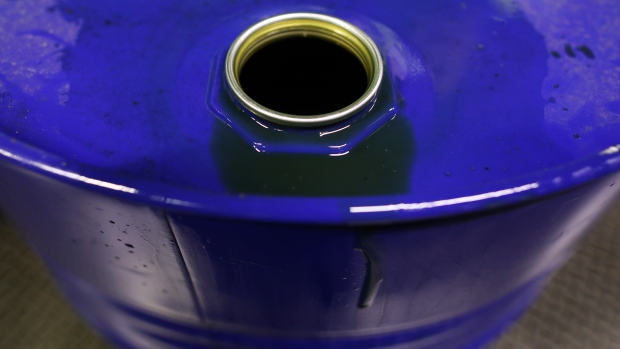 Excess fluid sits on the rim of a barrel of oil based lubricant at Rock Oil Ltd.'s factory in Warrington, U.K., March 13, 2017