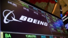 A monitor displays Boeing Co. signage on the floor of the New York Stock Exchange (NYSE) in New York, U.S., on Monday, Sept. 18, 2017. 