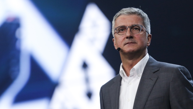 Rupert Stadler, chief executive officer of Audi AG, looks on as he unveils the Audi AG A8 sedan automobile during a launch event in Barcelona, Spain, on Tuesday, July 11, 2017. Stadler faces his toughest test since taking the helm at Audi ten years ago, as Volkswagen’s biggest profit contributor grapples with declining sales and widening legal probes into its role in the diesel scandal. Photographer: Pau Barrena/Bloomberg