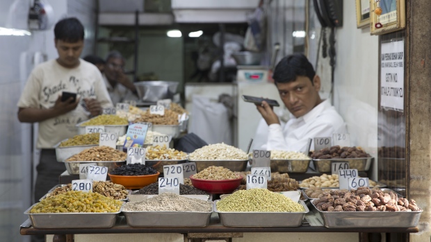 Dried fruits, nuts and spices are displayed at a store at Khari Baoli spice market in New Delhi