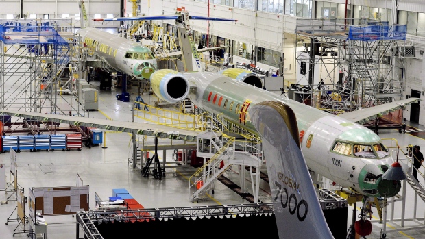 People tour the Bombardier Global 7000 aircraft and facility in Toronto, November 3, 2015
